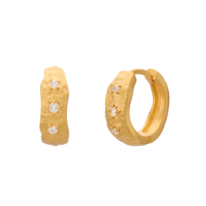 Murkani | 
Cosmic Love Huggie With White Topaz | 18KT Yellow Gold Plate