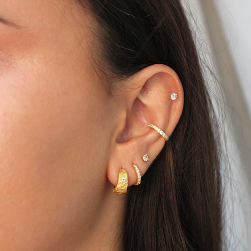 Murkani |  Cosmic Love Small Huggie With White Topaz | 18KT Yellow Gold Plate