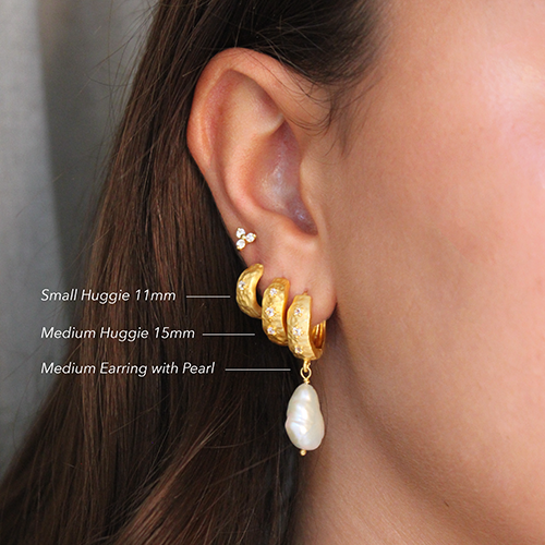 Murkani |  Cosmic Love Small Huggie With White Topaz | 18KT Yellow Gold Plate